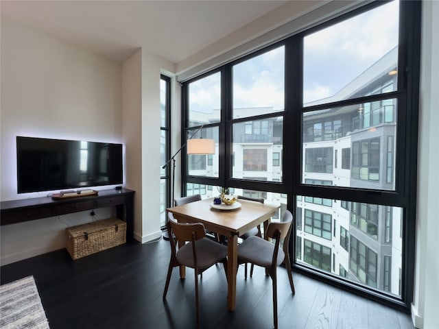 dining space featuring hardwood / wood-style floors