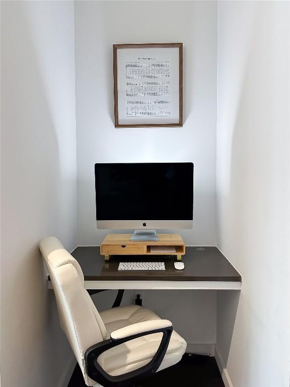 800 Embassy Dr Unit 530, Austin, TX 78702 - office area featuring baseboards