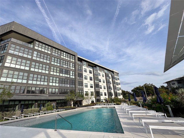 view of swimming pool featuring a patio