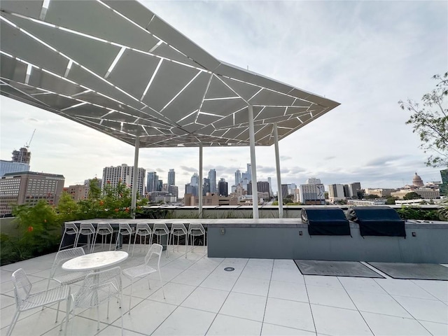 800 Embassy Dr Unit 530, Austin, TX 78702 - view of patio / terrace featuring a skyline view