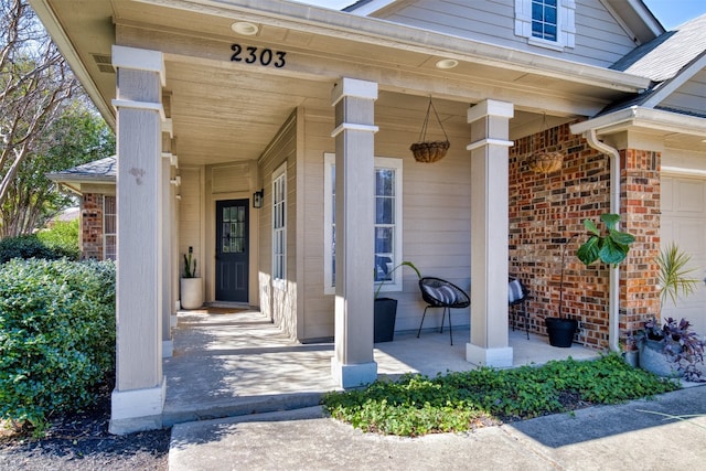 doorway to property with covered porch