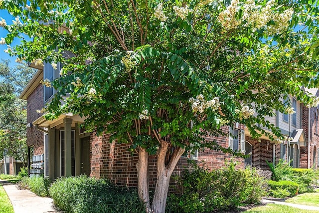 2000 Cullen Ave Unit 9, Austin, TX 78757 - view of property exterior featuring brick siding