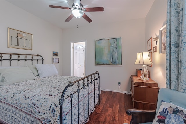 bedroom featuring ceiling fan and dark hardwood / wood-style flooring