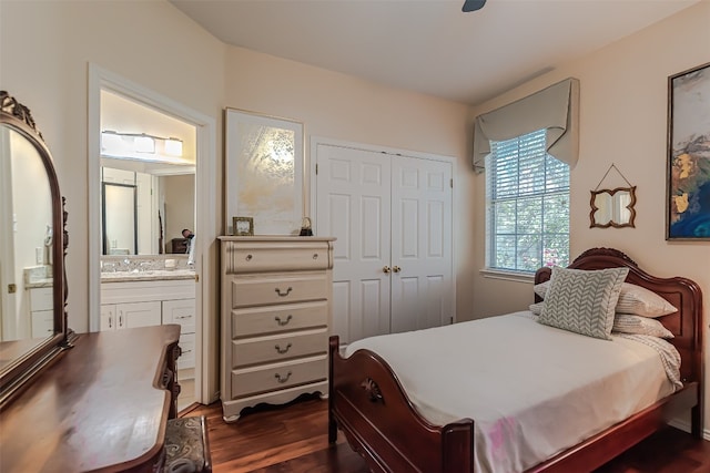 bedroom with sink, ceiling fan, dark hardwood / wood-style floors, connected bathroom, and a closet