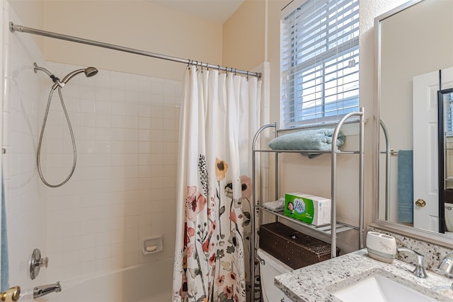 bathroom featuring shower / tub combo with curtain and vanity