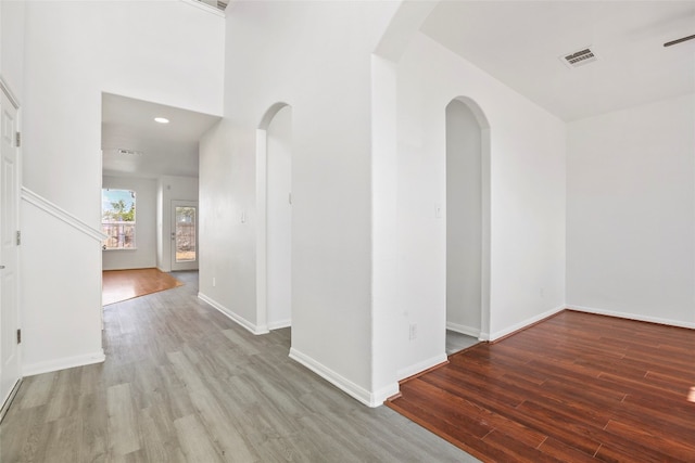 corridor featuring hardwood / wood-style flooring