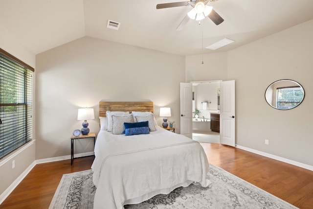 bedroom with hardwood / wood-style floors, lofted ceiling, and ceiling fan