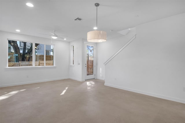 unfurnished room featuring ceiling fan