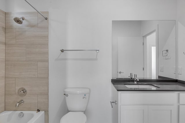 full bathroom with vanity, toilet, and tiled shower / bath combo