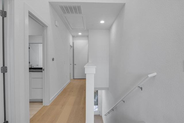 hallway featuring light hardwood / wood-style floors