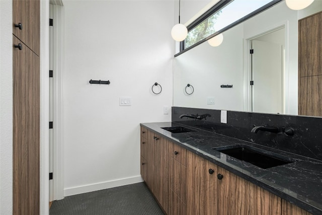 bathroom featuring vanity and tile patterned flooring