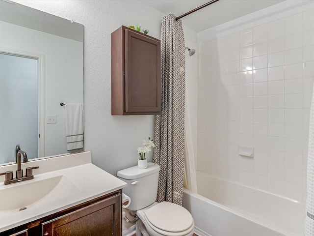 full bathroom featuring vanity, shower / bathtub combination with curtain, and toilet