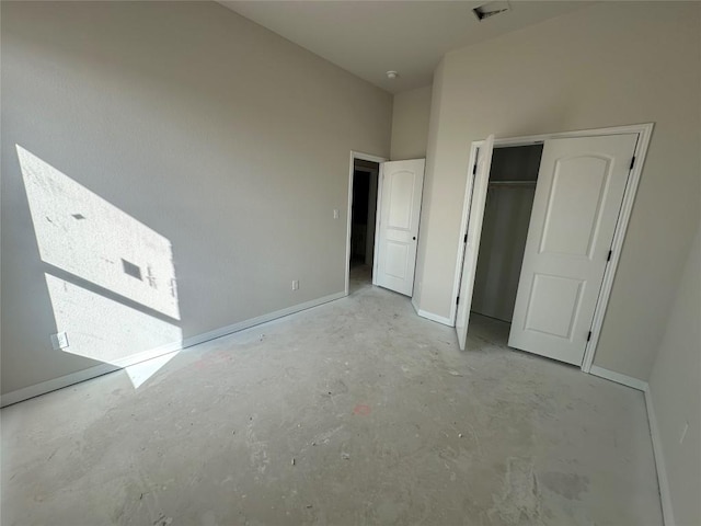 unfurnished bedroom with a closet