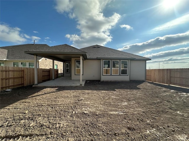 back of property featuring a patio