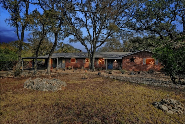 view of front of home with a yard