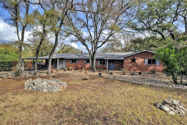 ranch-style house with a front yard