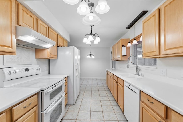 kitchen with a chandelier, sink, light tile patterned floors, pendant lighting, and white appliances