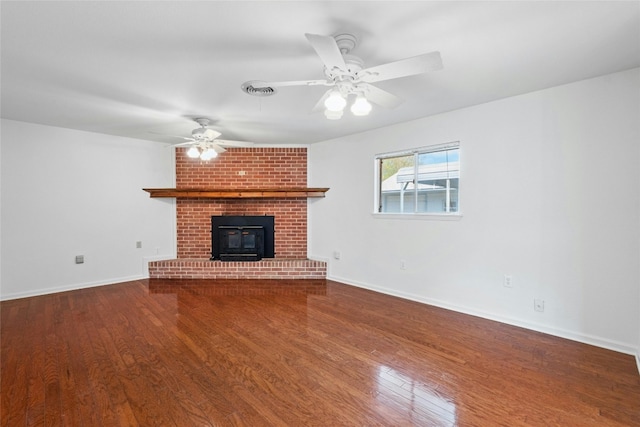 unfurnished living room featuring wood-type flooring and ceiling fan