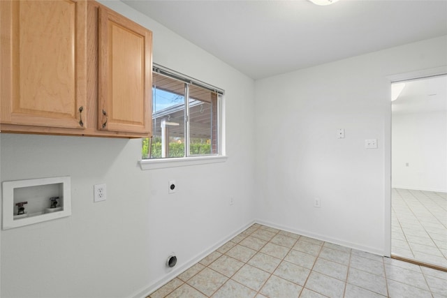 clothes washing area with cabinets, hookup for a washing machine, light tile patterned floors, and electric dryer hookup