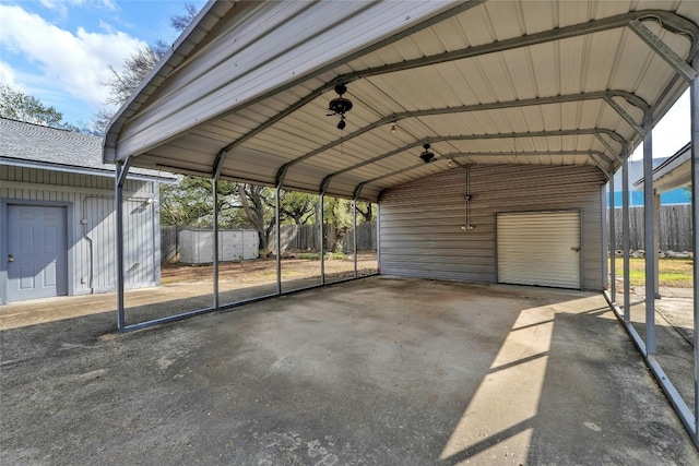 view of parking / parking lot with a carport