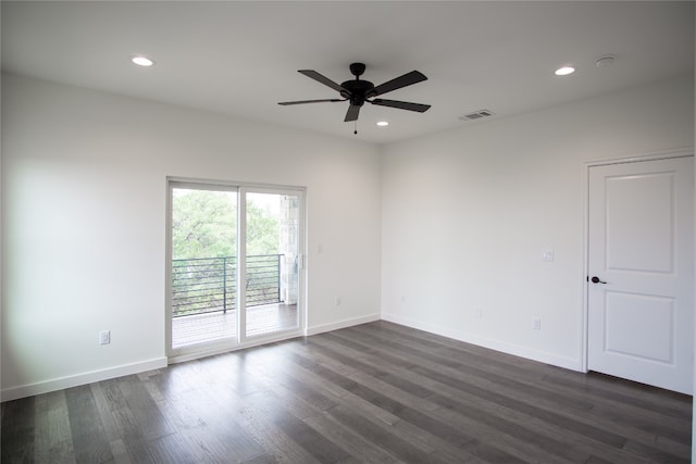 unfurnished room featuring ceiling fan and dark hardwood / wood-style flooring