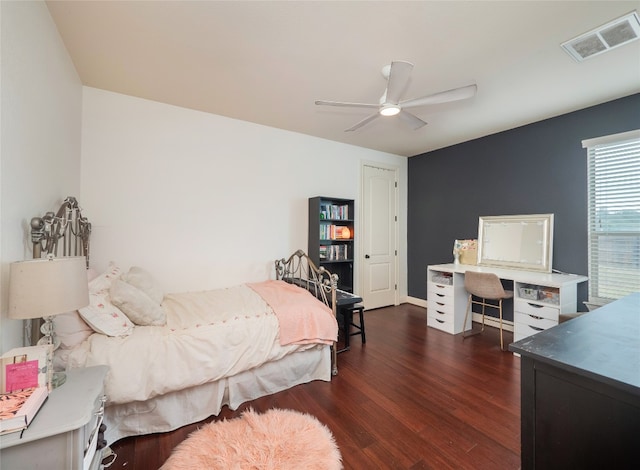 bedroom featuring dark wood-type flooring and ceiling fan