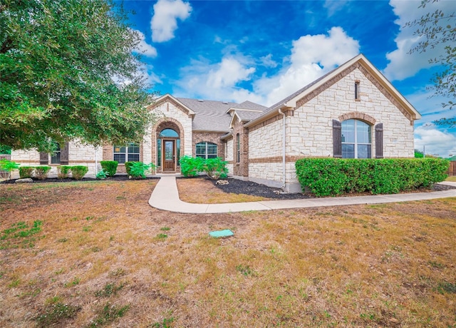 view of front of house with a front yard