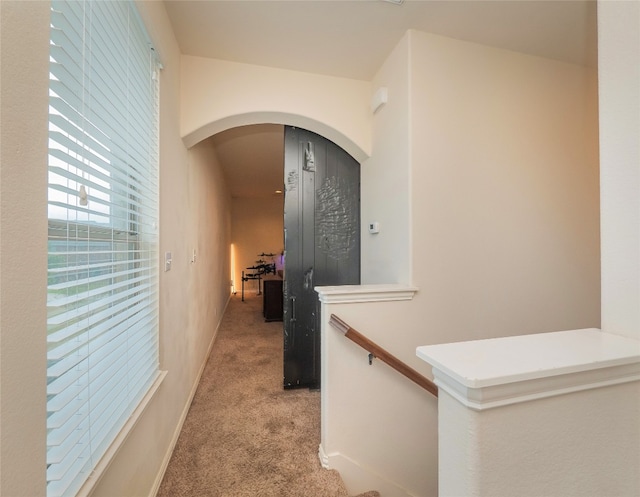 hallway with carpet