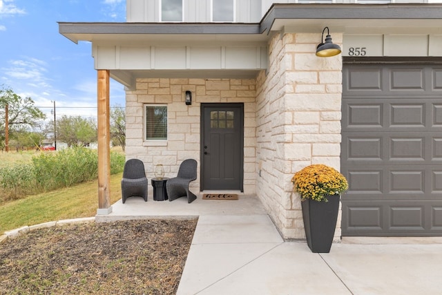 property entrance with a garage