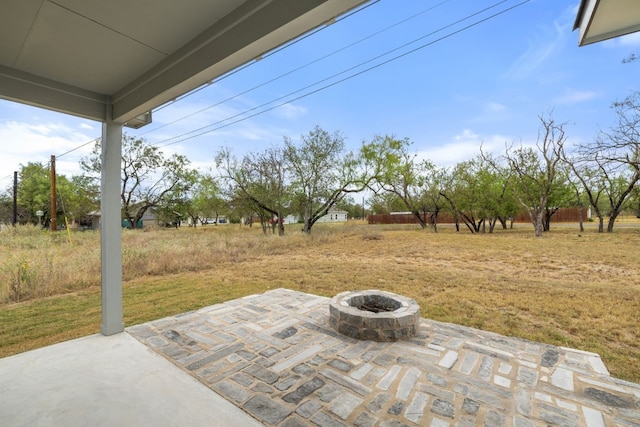 view of patio featuring a fire pit