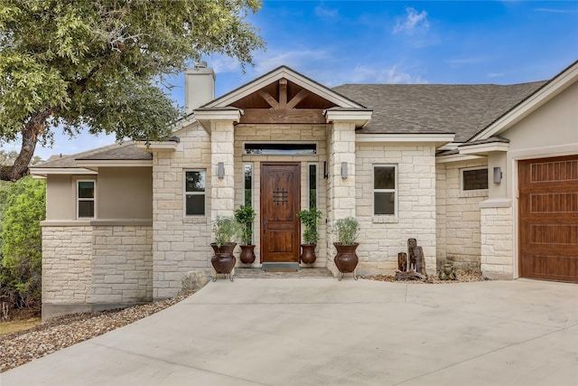 property entrance with a garage