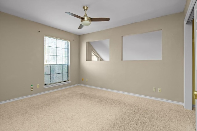 11310 Spicewood Club Dr Unit 10, Austin, TX 78750 - unfurnished room featuring carpet flooring, baseboards, and a ceiling fan