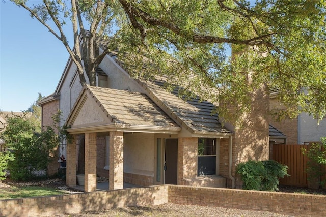 11310 Spicewood Club Dr Unit 10, Austin, TX 78750 - view of front of house with brick siding and stucco siding