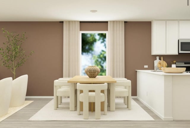 dining room featuring hardwood / wood-style floors