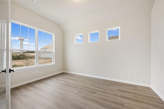 empty room featuring hardwood / wood-style flooring