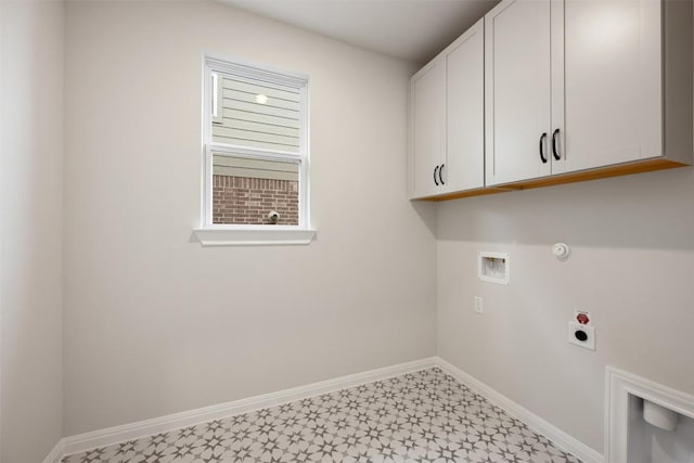 washroom with cabinets, washer hookup, gas dryer hookup, and hookup for an electric dryer