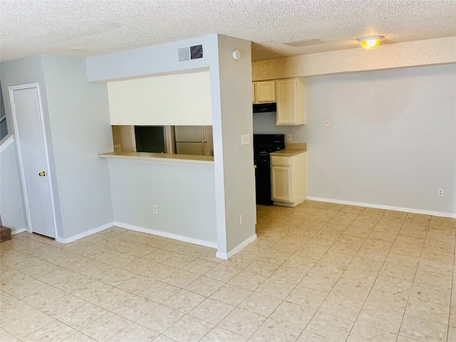 interior space with a textured ceiling