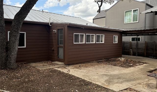 back of house with a patio area