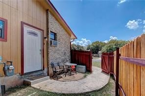 view of property exterior with a patio