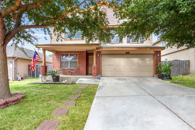 view of front facade with a garage and a front yard