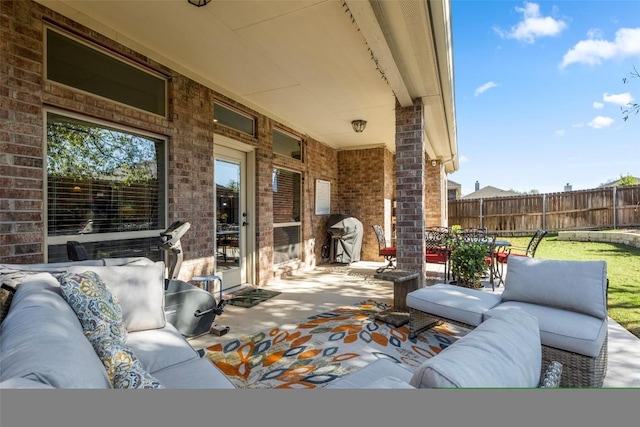 view of patio / terrace featuring a grill and outdoor lounge area