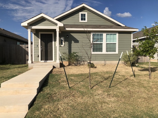 view of front of home with a front yard