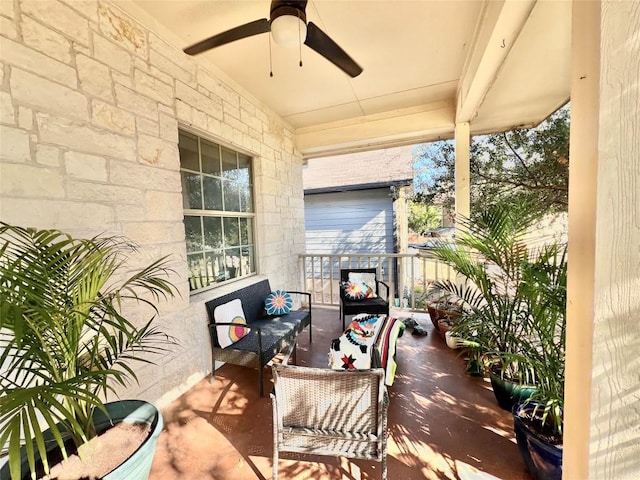 view of patio / terrace with an outdoor living space and ceiling fan