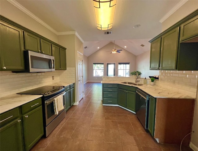 kitchen featuring kitchen peninsula, appliances with stainless steel finishes, ceiling fan, and green cabinetry