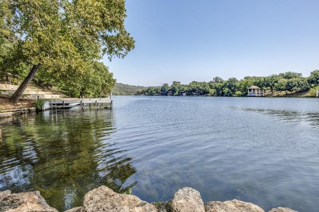 property view of water featuring a boat dock