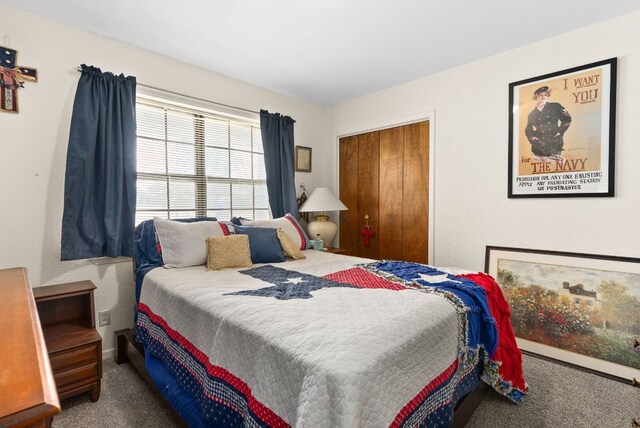 bedroom featuring a closet and carpet