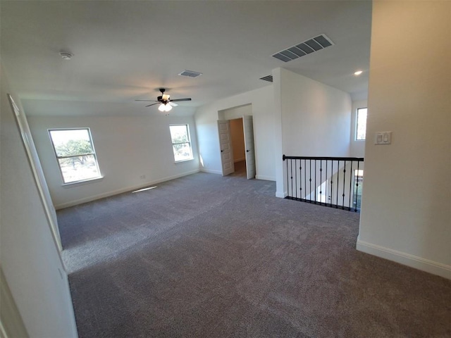 carpeted empty room with ceiling fan