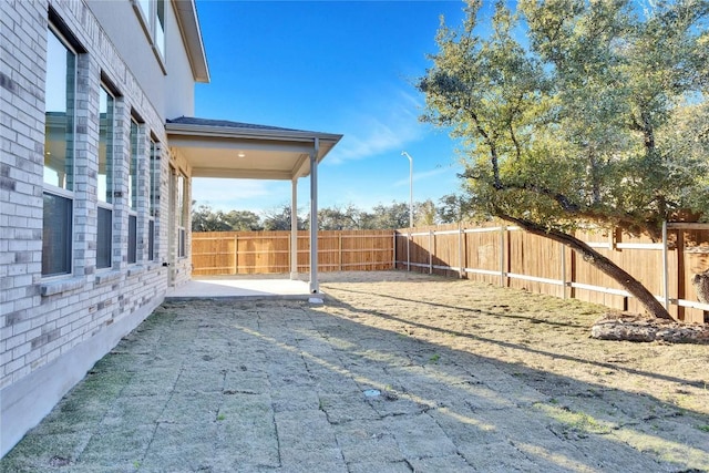 view of yard with a patio area