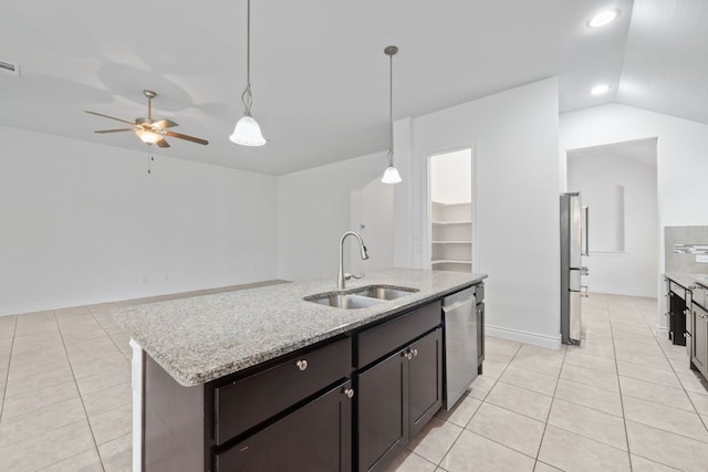 kitchen with sink, light tile patterned floors, an island with sink, pendant lighting, and appliances with stainless steel finishes