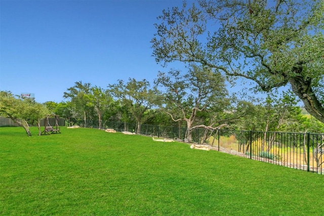 view of yard with a trampoline